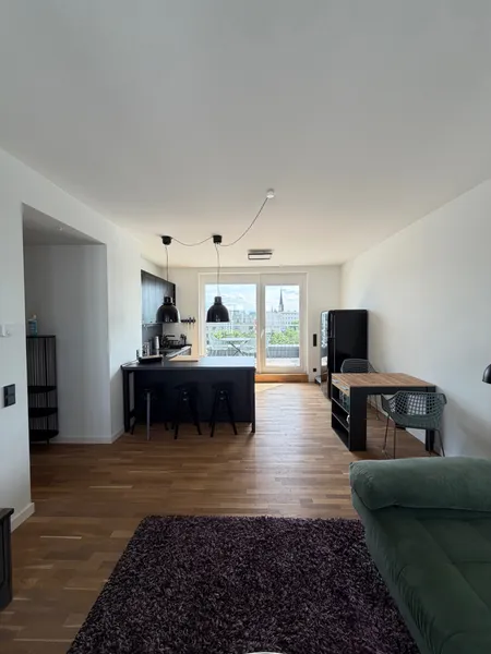 Exklusive 2 Zimmer Wohnung mit großer Sonnenterrasse & TG-Stellplatz (E) — photo 1
